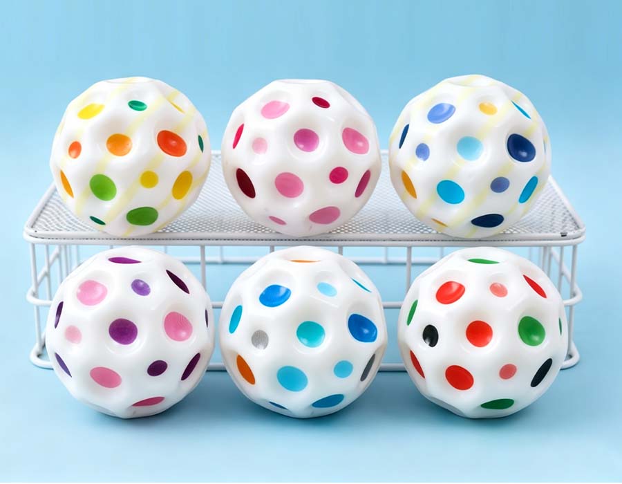 Multicolor Perforated Ball — White Stretchy Toy